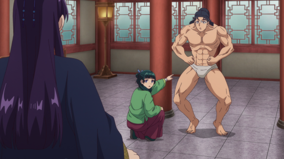 Scene from The Apothecary Diaries S1E21. A muscular man wearing just a loincloth flexes, while a small woman in a green robe squats to point at his crotch. They both look surprised at the man with long dark hair in a dark royal robe who has just walked into the foreground.